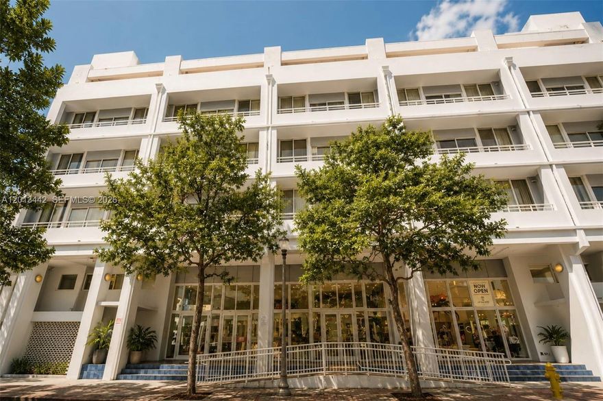 Perfectly positioned in the epicenter of Coconut Grove's Village, Residence 307 at CocoStyle places Peacock Park, Ariete, Greenstreet Café, and Biscayne Bay’s waterfront promenades just moments away. Completely renovated with every detail thoughtfully reimagined, this turnkey, spacious residence feels entirely brand new throughout. The spacious one-bedroom, two-bathroom layout is elevated by high-end designer finishes, including chevron hardwood flooring, soft lime wash walls, custom cove LED lighting, and floor-to-ceiling sliding glass doors that open to a private balcony overlooking Coconut Grove’s lush tree canopy.  The all-new kitchen features taupe matte cabinetry, brass hardware, and a travertine-inspired backsplash, creating a refined contemporary aesthetic. The luxurious guest bath features a dramatic botanical mosaic walk-in shower, walnut vanity, and illuminated mirror, while the primary full bath offers a soaking tub and shower wrapped in lighter floral mosaic finishes.  A rare flex space functions perfectly as a private office, den, or guest retreat—adding exceptional versatility beyond a typical one-bedroom floor plan.  Residents enjoy a rooftop pool deck with bay views plus one assigned garage parking space.