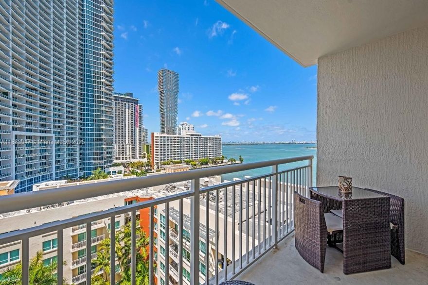 In the heart of Edgewater Miami, this condo is perfect for a buyer planning to occupy at closing or for an investor! The living area is filled with natural light coming from the balcony overlooking the bay and pool. A flexible dining area can serve as a den or home office, complemented by a stylish open kitchen and in-unit washer/dryer. Spacious bedrooms feature large closets. Amenities include a beach entry resort-style heated pool, lighted jacuzzi, fitness center, club & Yoga room, and 24-hour valet. Across from Margaret Pace Park with bayfront sports and activities. Includes 1 assigned parking. The current tenant has a month-to-month lease with a 45-day termination notice required from either party. Rentals are permitted with a minimum lease term of 30 days.