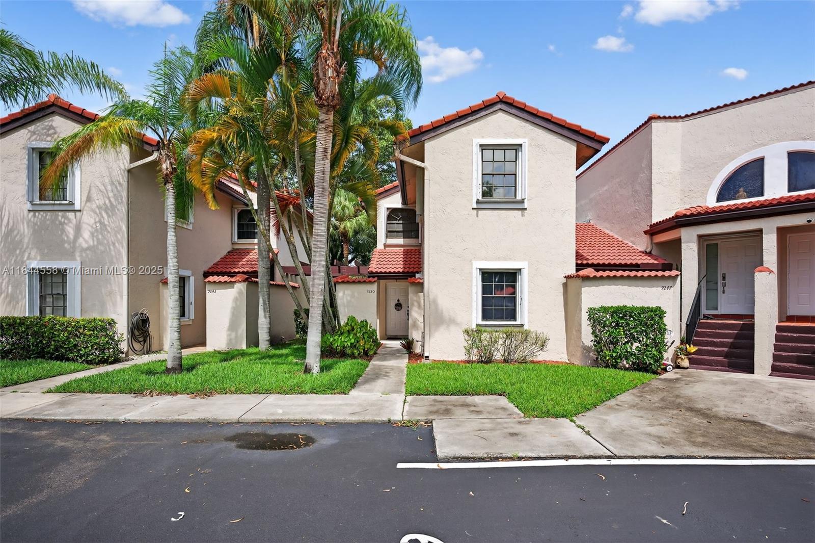 Renovated 3 bed, 3 bath fee simple townhome in gated community Lakeview Courts @ Jacaranda. Bright, open layout with porcelain tile on main floor. One bedroom with full bath downstairs. Updated kitchen features white cabinetry, quartz countertops/backsplash, and pantry. Upstairs has two bedrooms with ensuite baths and laminate flooring. All bathrooms are fully remodeled. AC unit installed (Dec. 2021). Newer washer/dryer. Neutral paint colors. Impeccably maintained. Accordion shutters. Enjoy the privacy of a large greenspace behind the home w/ no rear neighbors. Community pool. HOA fee includes roof. 2 assigned parking spaces.