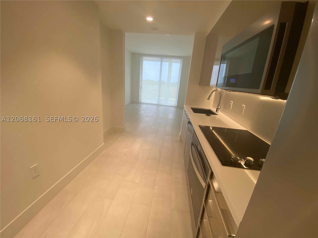 Photo of 2000 Metropica Way #308, Sunrise, FL 33323 (MLS # A12068161)