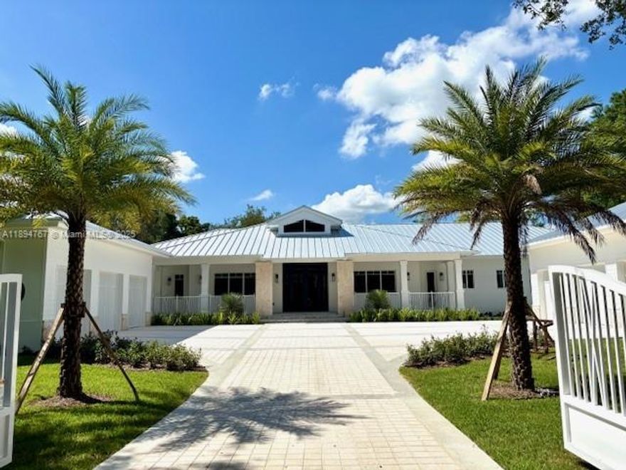 Pinecrest Show Piece !  2025 Custom Home , 1 acre Heated Pool  61 ft x 17 ft spa 15 people, sun deck in pool,Generator Kohler 38KW whole house, Gas 1000 gallon underground LP Tank,3 Gas Tankless Hot water heaters, AC-Rheem High efficiency 4 units,Lutron Lighting, outside Covered Chef kitchen with granite tops ,built in gas barbecue , Gorgeous White  Kitchen-Quartzite Taj Mahal countertop, Sub zero Freezer/refrig/wine column,  Professional Wolfe Gas Range 48inch , Wood cabinets,8 Rooms 9 bathrooms- including Master Bedroom w/sitting area,huge shower and soaking tub, study/office, + staff bedroom, 4 additional bedrms,plus separate guest house with kitchen,wash/dry, bathroom, exterior pool cabana bath, shower,
 living Rm 18 ft ceilings,All rooms min 11 ft,Entry Gate,Cameras, Sprinkler system