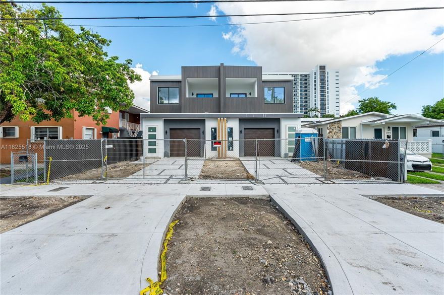 ALMOST FINISHED. Luxurious new-construction townhome, ideally located just steps from Coral Gables ,Coconut Grove & downtown Miami. This 4/4.5 residence with a loft offers 2,750SF of thoughtfully designed interior space, blending contemporary elegance with everyday comfort. The gourmet kitchen is a show piece, featuring premium appliances, custom European cabinetry, quartz countertops, and a floating waterfall island. Floor-to-ceiling impact-rated windows flood the home with natural light. Retreat to your private outdoor sanctuary with a heated pool & lush landscaping. A 1 car garage with a 23’ driveway offers space for additional parking. Additional features include an automated aluminum gate, EV charger, CCTV-ready smart home technology, and integrated security cameras.