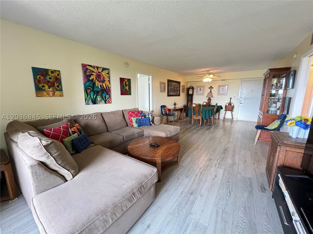 Photo of 1400 Saint Charles Pl #701, Pembroke Pines, FL 33026 (MLS # A12036845)