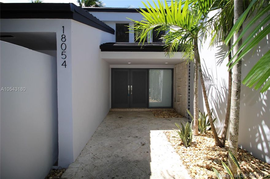 Custom Built Tropical Oasis in Palmetto Bay, 3 Large Br's 2.5 Bths, plus a play room or Den for the kids, 2 car garage.  Very spacious home. Large open floor plan with vaulted ceilings.  White Modern Kitchen, with stainless steal appliances & granite counter tops, overlooking pool area. Large formal dinning room overlooking waterfall pond. Great for relaxing dinners.   Elevated Whirlpool overlooking Beautiful Large Pool, with waterfall. Pool & Whirlpool have been newly refinished with Diamond Brite.   Beautiful Lush  Tropical Landscaping all around the Home , with a large fenced yard. Home sits on a popular canal in Palmetto Bay, canal connects to lakes, great for boating, fishing skying, canoeing.  A must see!!!!