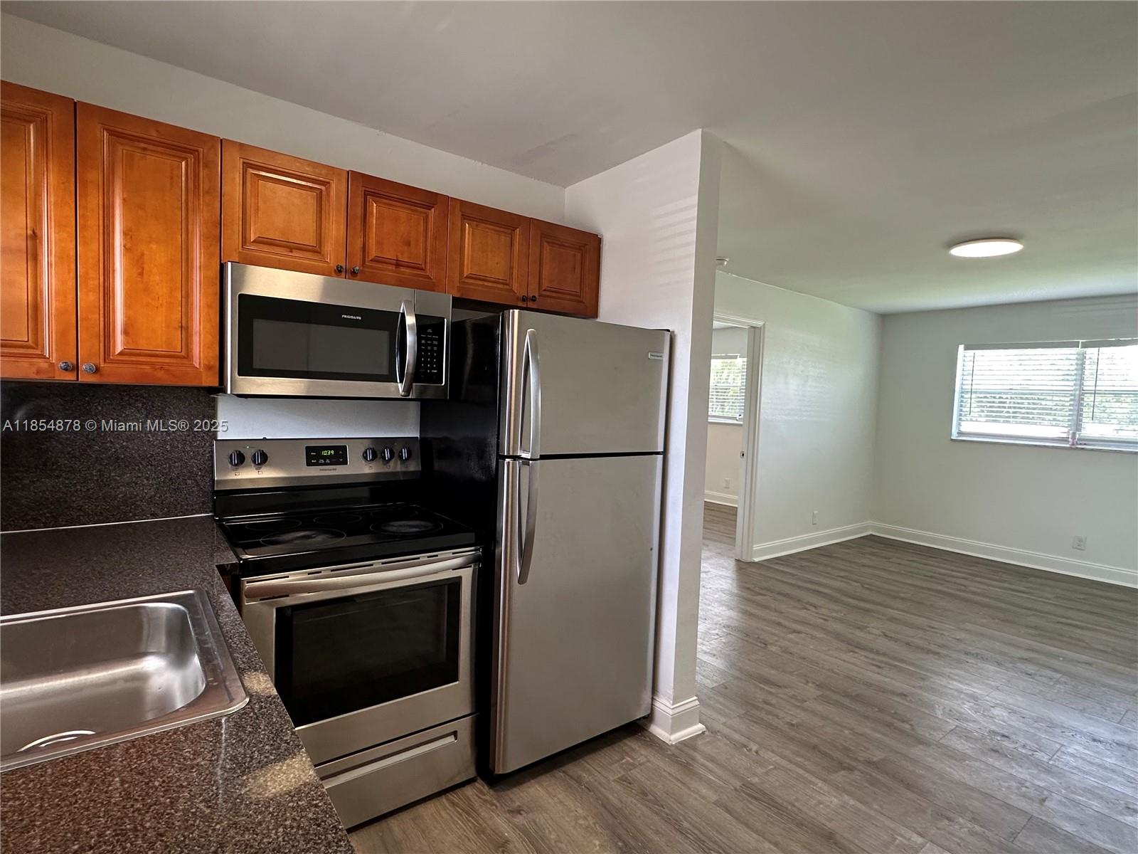 Spacious and NEWLY REMODELED 2 bed/1bath in Davie!!! Charming 2nd floor, corner unit with beautiful new flooring, granite countertops, cabinets, new lighting, and central AC. Large living and dining room area with full kitchen and brand new appliances. Plenty of closets for storage space. Located in a quiet community, with a full laundry room on-site. Waste, maintenance, pest control + 1 assigned parking space included. Guest parking on property. Pets welcome with 1x pet fee. Property is in a great area - centrally located yet tucked away on a quiet street, close to all of the major highways (A1A, US1, I-95, turnpike etc). Down the street from Nova! Everything nearby such as shops, restaurants, schools & parks...Only 10 min from Hard Rock, Seminole Casino, Dania Point, Broward Mall & more!