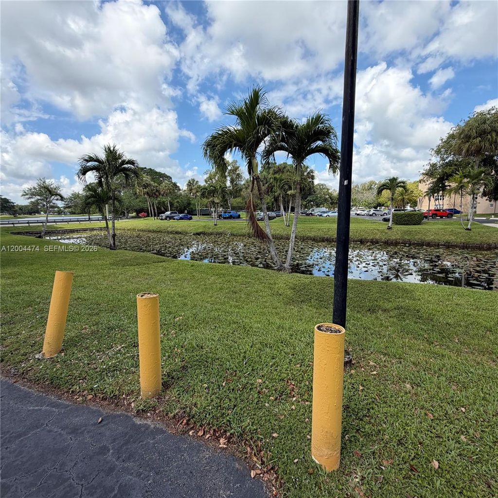 Photo of 9440 Tangerine Pl #206, Davie, FL 33324 (MLS # A12004474)