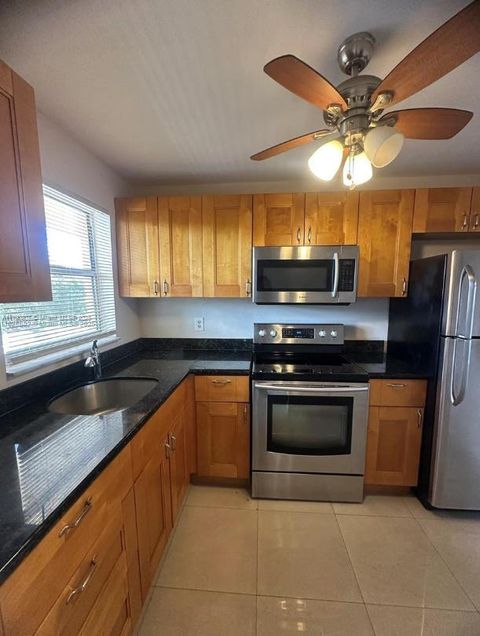 Photo of 8400 Sunrise Lakes Blvd #310, Sunrise, FL 33322 (MLS # A11790807)