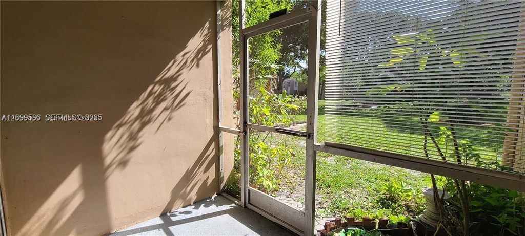 Photo of 9410 Live Oak Pl #109, Davie, FL 33324 (MLS # A12035459)