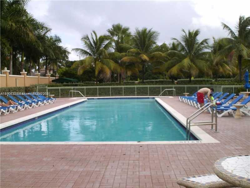 THE COURTS AT DORAL ISLES - Residential Lease