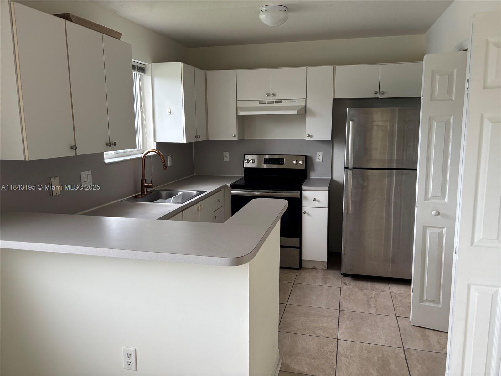 Spacious 3-bedroom, 2-bath condo corner unit that features tile flooring through with washer and dryer inside the unit. Ample primary bedroom with walk-in closet. Gated community with around the clock monitored access, security, a clubhouse, and community pool.