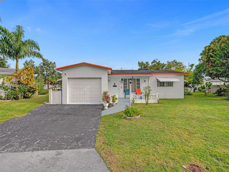Welcome to this charming single-family home situated in the highly sought-after 55+ community of Lauderdale
Lakes. This residence offers 2 bedrooms and 2 bathrooms. The master bedroom includes a walk-in closet. With a
one-car garage, you'll have ample space for parking and storage needs.The centerpiece of this home is its recently
remodeled kitchen, featuring a beautiful quartz countertop. The open floor plan seamlessly connects the kitchen to
the spacious living area, providing an ideal setting for entertaining guests. Additionally, the large Florida room
offers an extra space for relaxation.New laminate flooring throughout the home adds a touch of elegance. Step
outside to explore the expansive backyard, complete with flourishing fruit trees, offering a serene outdoor retreat