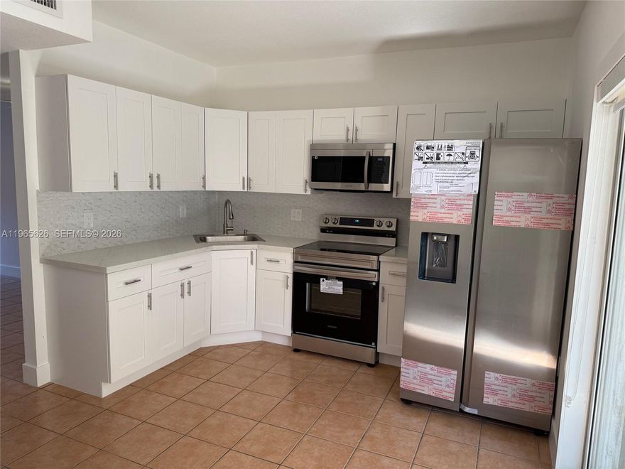 Beautifully Remodeled Townhouse with New Kitchen Cabinets, Quartz Countertops, New Stainless Steel Appliances, All new Light Fixtures, Baseboards, Electrical Outlets, Closet Doors and completely painted.
Large patio, Large Closet space, 2 assigned parking spaces. Located within minutes to Dolphin Mall, FIU and Miami Airport. This is a great location in a totally remodeled condition. This is a 2 Story Townhouse. Lowest Priced Townhouse in the entire area. Ready to move in now! Will sell fast. Priced to Sell!
