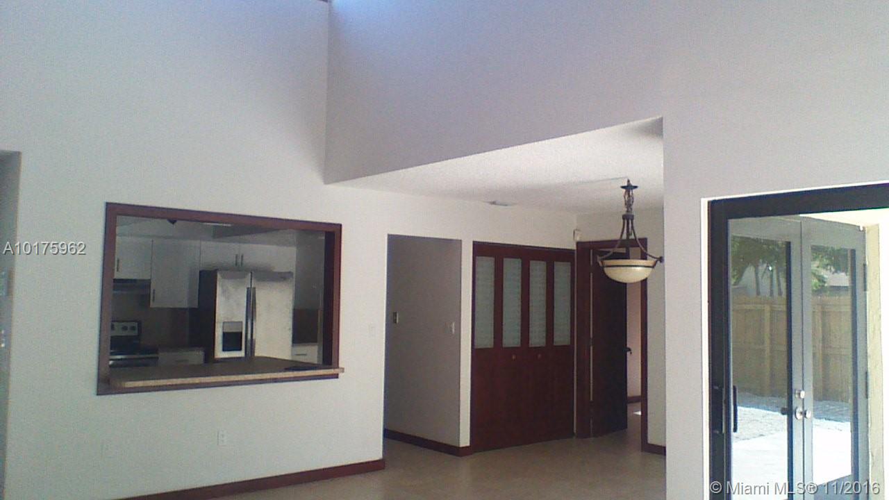 BEAUTIFUL HOME IN GATED COMMUNITY, ACROSS FROM FALLS SHOPPING CENTER . PLENTY OF PARKING SPACE. COMPLETETLY REMODELED, KITCHEN, BATHROOMS, NEW FLOORS, NEW DOORS, FRESHLY PAINTED. EASY ACCESS TO CORAL GABLES & SOUTH MIAMI.