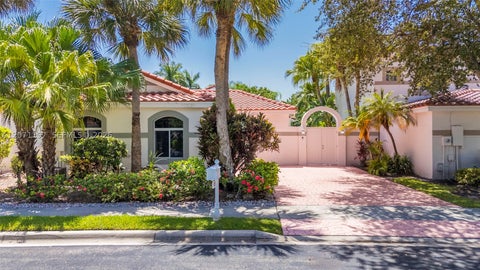 Photo of 1051 Bel Aire Dr W, Pembroke Pines, FL 33027 (MLS # A12071197)