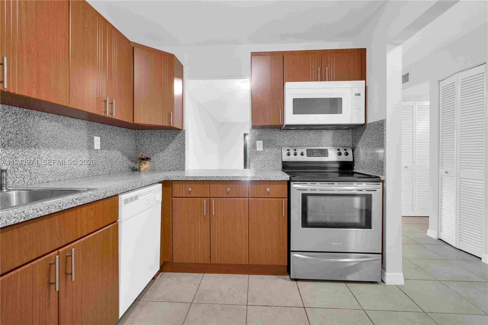 COURTYARDS AT KENDALL CON - Residential