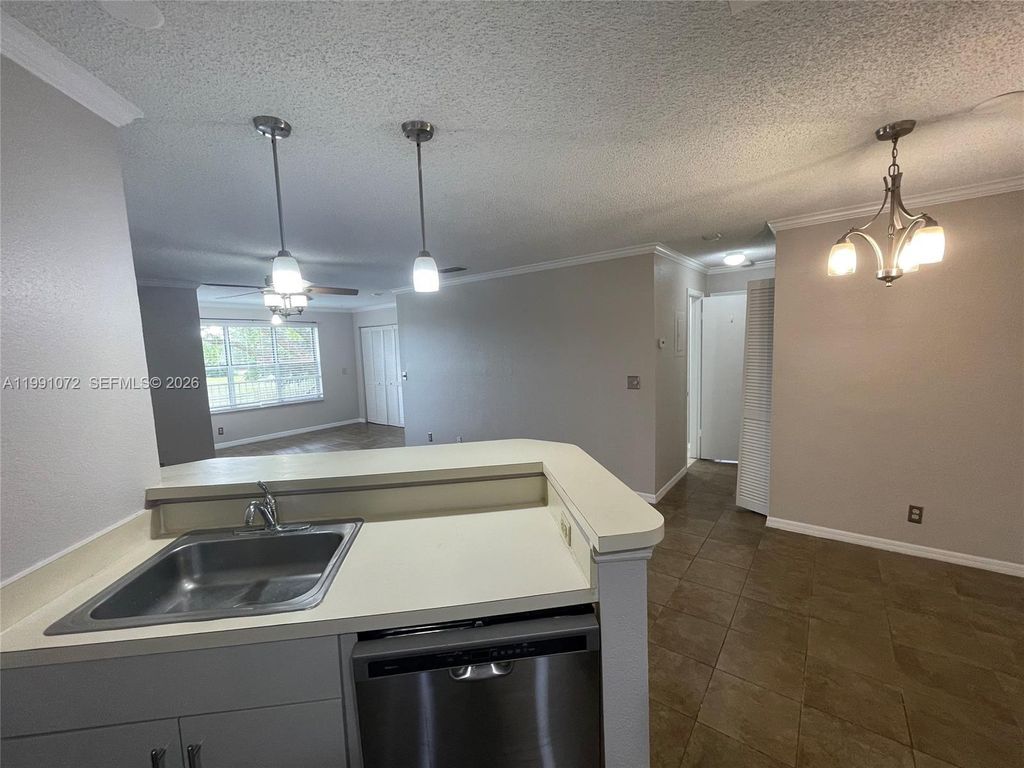 Photo of 3390 N Pinewalk Dr N #1027, Margate, FL 33063 (MLS # A11991072)