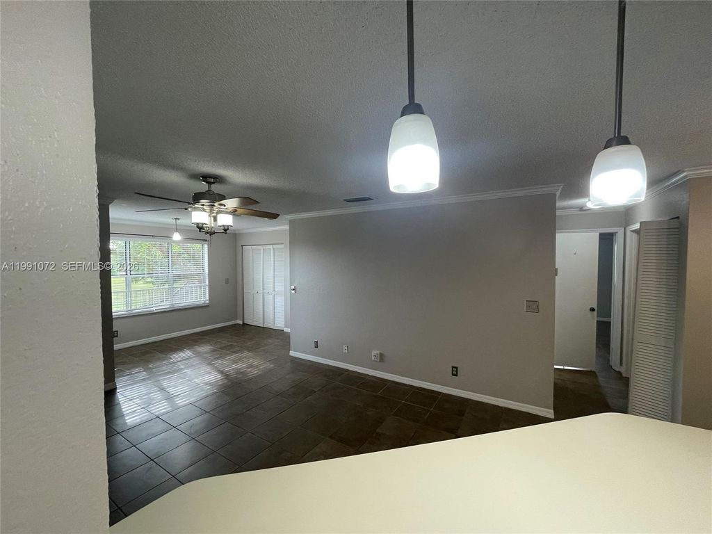 Photo of 3390 N Pinewalk Dr N #1027, Margate, FL 33063 (MLS # A11991072)