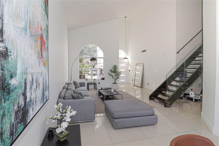 Beautiful two-story single-family home located in the prestigious Doral Isles – Oasis community. Fully Furnished,  This residence features 4 bedrooms and 3 full bathrooms with a spacious and functional layout, offering bright living areas filled with natural light and ideal spaces for family living and entertaining. The backyard is a true highlight, showcasing a private pool with serene lake views, perfect for outdoor gatherings and relaxation. Residents enjoy resort-style amenities including a clubhouse, fitness center, swimming pools, tennis and sports courts, green areas, and gated security. Prime location near A-rated schools, shopping centers, restaurants, major highways, and world-class golf courses, making this property an excellent opportunity to live or invest in one of Doral’s most desirable communities.