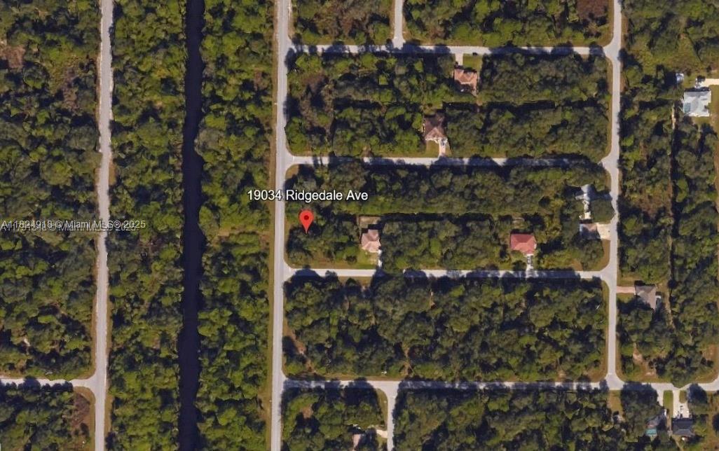 Discover an exceptional opportunity with this 0.51-acre corner lot, zoned for duplex construction. This prime parcel offers serene canal views, providing a tranquil setting for future residents. Situated in a growing area, this lot presents a unique investment prospect in a desirable location.