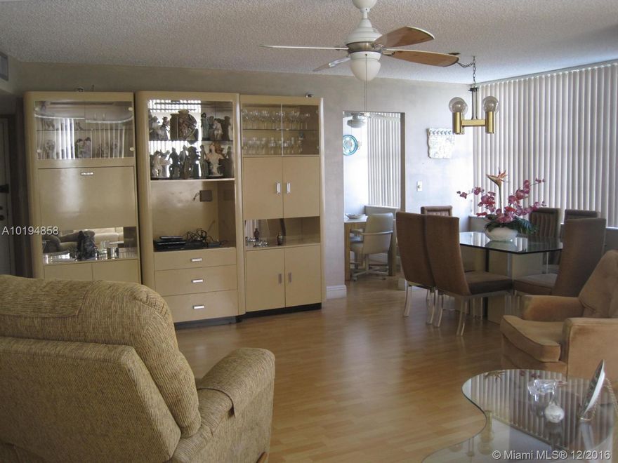 Spacious 2 bedroom 2 bath corner unit centrally located in Pembroke Pines. Adjacent to Pembroke Lakes Golf & Country Club. One mile walking/bike path. Resort style gated community including a Clubhouse, card/video room, billiard room, 4 heated pools, saunas, 6 tennis courts, and an Internet Café. A private bus service takes residents to local grocery stores & malls, with special trips to local attractions and special events. OK to lease right after closing. 55 + community. Association requires 20% down.