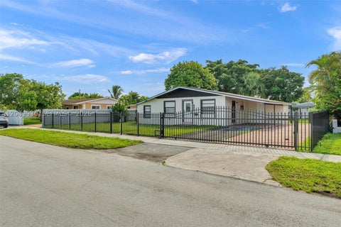Photo of 20060 NW 14th Ct, Miami Gardens, FL 33169 (MLS # A12089930)