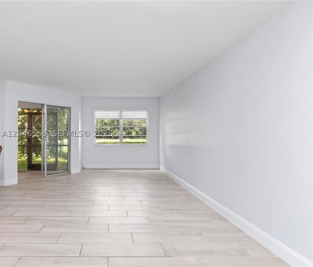 Photo of 1110 SW 125th Ave #112M, Pembroke Pines, FL 33027 (MLS # A12046555)