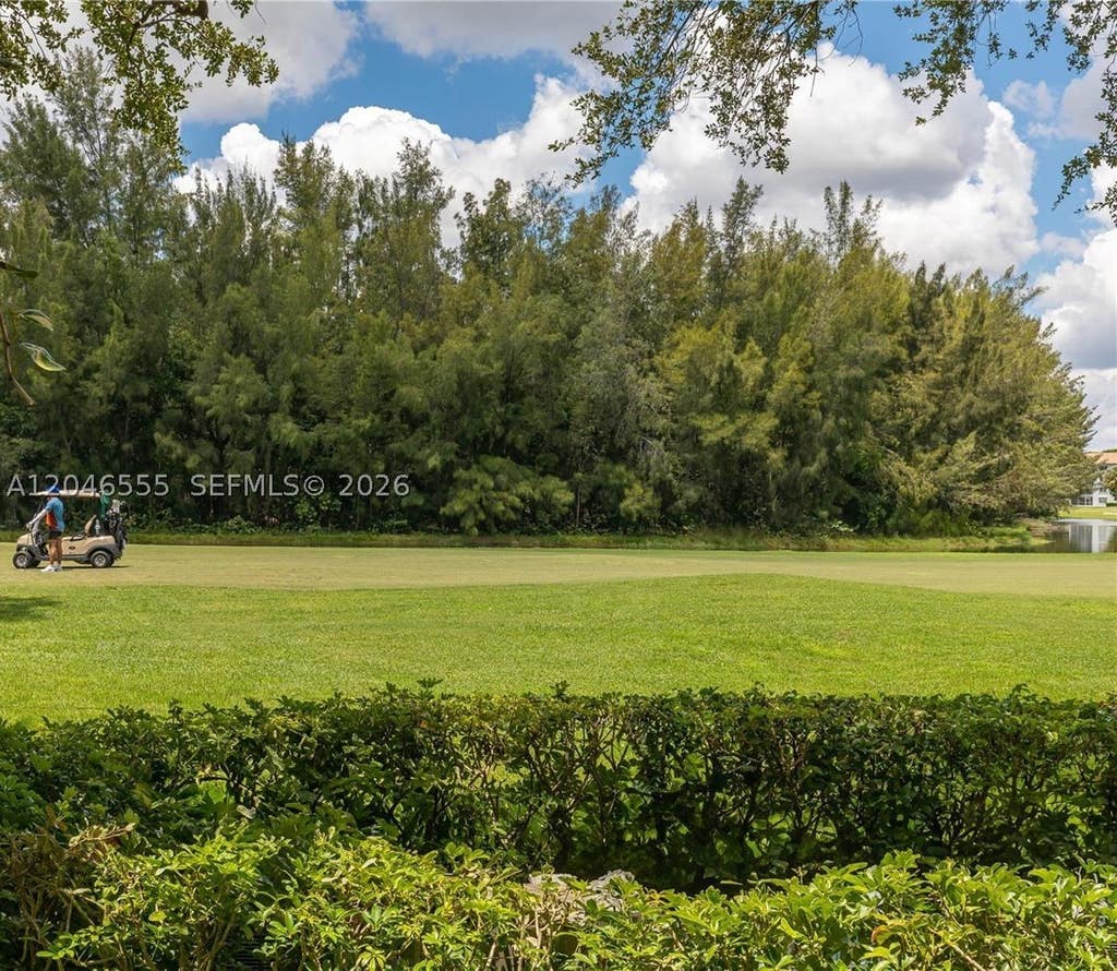Photo of 1110 SW 125th Ave #112M, Pembroke Pines, FL 33027 (MLS # A12046555)