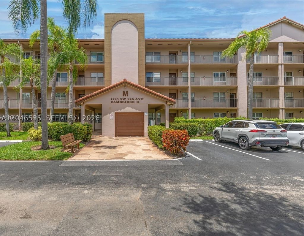 Photo of 1110 SW 125th Ave #112M, Pembroke Pines, FL 33027 (MLS # A12046555)