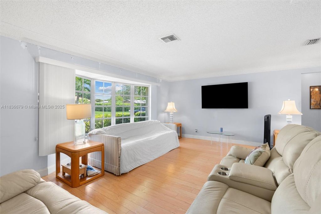 Photo of 10620 NW 41st St, Coral Springs, FL 33065 (MLS # A11836679)