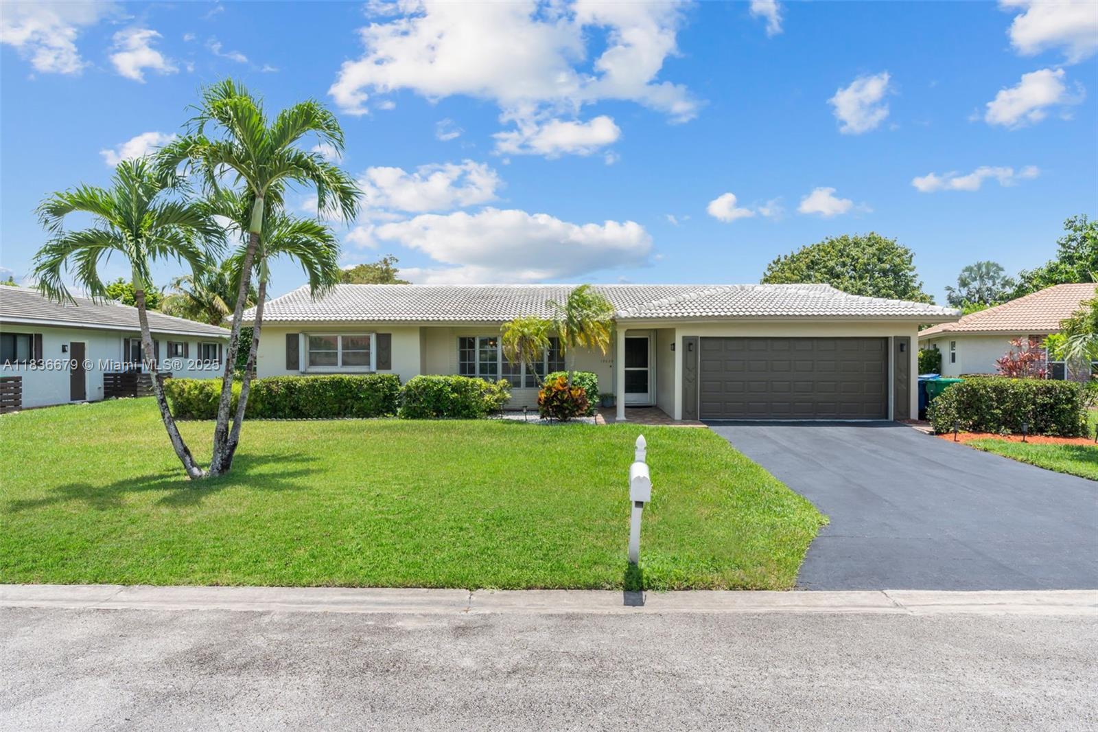 Welcome to this charming 3/2 home located at 10620 nw 41st. coral springs in the desirable Chevy Chase neighborhood. this property features a private screened in pool and is situated on a tranquil canal, offering serene water views.the home boasts hurricane protection with accordion shutters and impact sliders for added peace of mind, along with a clear panel for the front bay window to maximize natural light.A spacious 2 car garage provides ample parking and storage. perfect for families seeking peaceful waterfront retreat.close to shopping, parks, and schools.Schedule your showing today!