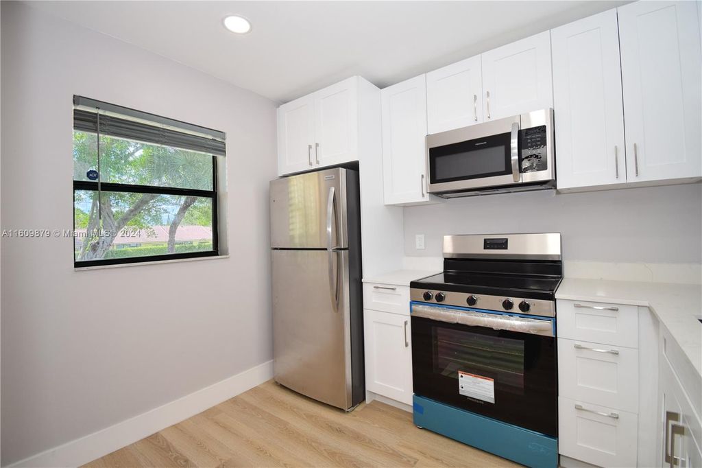 Photo of 6704 S Palmetto Cir S #202, Boca Raton, FL 33433 (MLS # A11609879)