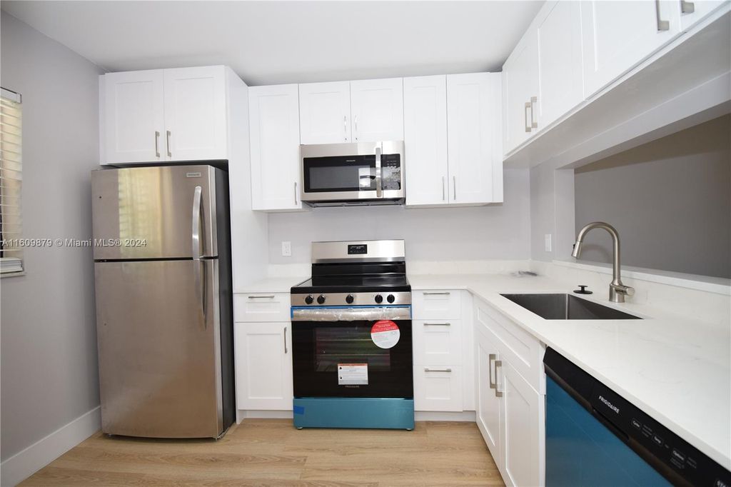 Photo of 6704 S Palmetto Cir S #202, Boca Raton, FL 33433 (MLS # A11609879)