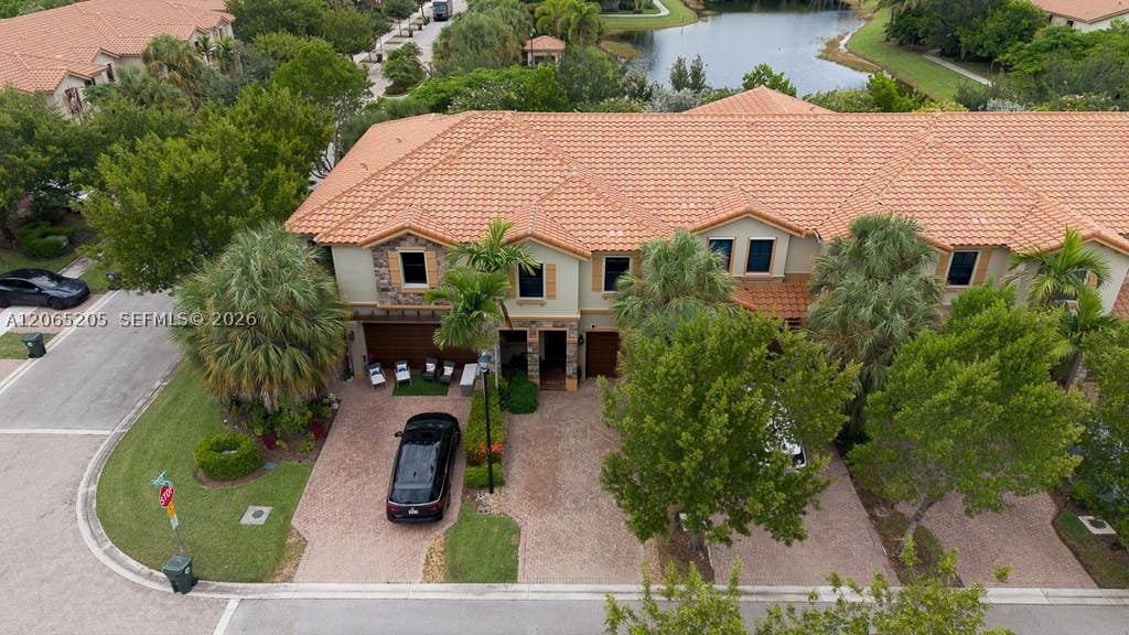 Photo of 6943 Halton Park Ln, Coconut Creek, FL 33073 (MLS # A12065205)