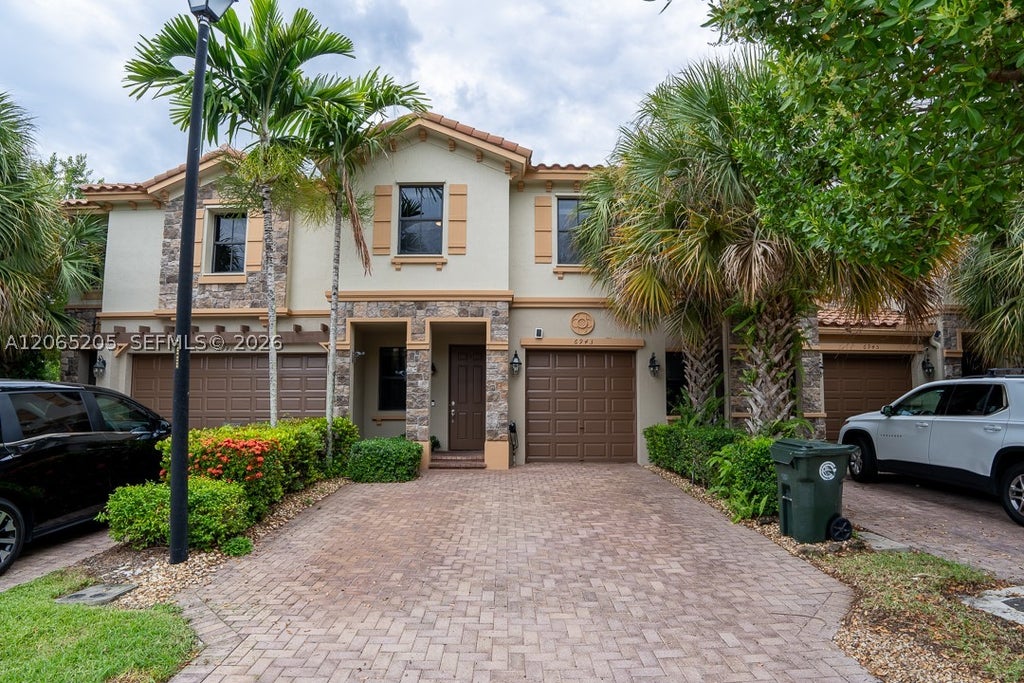 Photo of 6943 Halton Park Ln, Coconut Creek, FL 33073 (MLS # A12065205)