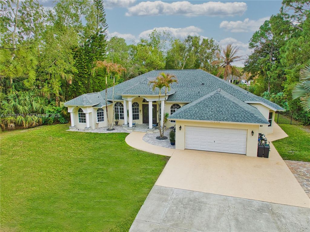 Photo of 11576 N 153rd Ct N, Jupiter, FL 33478 (MLS # A12011976)