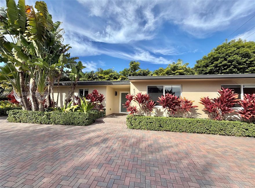 Spectacular, fully renovated corner-lot gem flooded with natural light. Every detail has been meticulously upgraded, including the roof, electrical, plumbing, kitchen, bathrooms, A/C, impact windows and doors, flooring, and more. The home features a dedicated laundry room and a spacious primary suite with an oversized walk-in closet. Enjoy a covered, well-lit outdoor patio ideal for entertaining. A separate work casita with its own mini-split provides excellent flexibility. Located in a prime neighborhood, offering the perfect blend of comfort, convenience, and style.