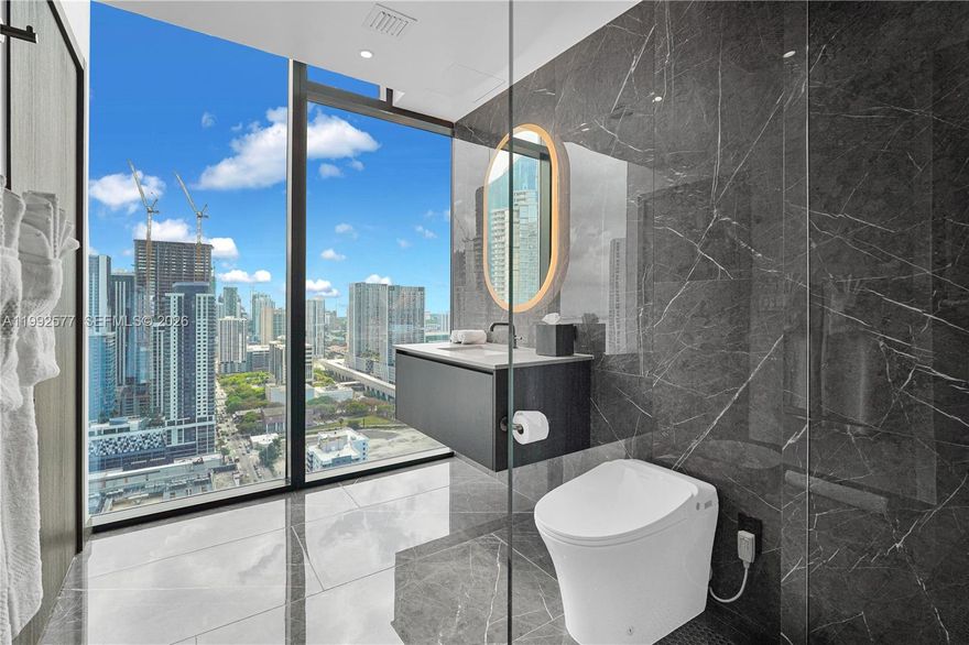 Live elevated at Eleven Residences Miami, a bold 65-story tower. This fully furnished 2 Bed 2 Bath, turnkey residence is outfitted with a designer furniture and housewares package, offering a seamless move-in or an effortless opportunity to use short-term rental program. Take in breathtaking views from sunrise over the Atlantic and Biscayne Bay to the glittering Downtown skyline at night. Designed around lifestyle and experience, residents enjoy access to wellness and fitness offerings at Chopra Spa & Studio, along with thoughtfully curated art and stylish social spaces throughout the building. Enjoy exclusive access to the world-famous E11EVEN Miami, a high-energy, 24-hour entertainment venue, along with a casino-style sports lounge and vibrant day club. The resort-style pool deck features multiple levels, private cabanas, skyline views, and live entertainment, creating an unmatched atmosphere above the city. Whether you’re seeking a private Miami escape or a high-performing investment, this residence delivers the perfect blend of luxury, flexibility, and lifestyle, complete with concierge, valet, co-working spaces, and full-service amenities.
