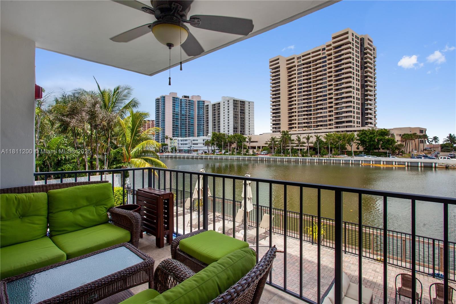 Bright corner unit offering 1300 sq. ft of living space with expansive views of Indian Creek Canal. This unit features a large balcony, two spacious bedrooms with ample closet space, and an extra room. Updated travertine bathrooms, beige porcelain floors, stainless steel appliances, high impact windows, and in-unit washer and dryer. The building boasts new amenities, including a heated pool. Private parking space included. Nestled in the quiet Collins Park neighborhood, just steps from the ocean via a charming footbridge. Close to the Faena district, Lincoln Road, and all Miami Beach attractions. Easy to show! Schedule your private showing today!