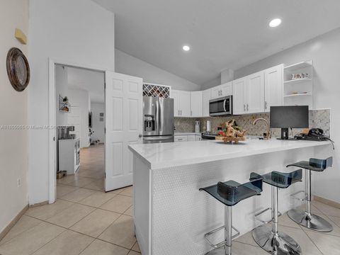 Single Family Residence in Miami FL 14353 169th St St 18.jpg