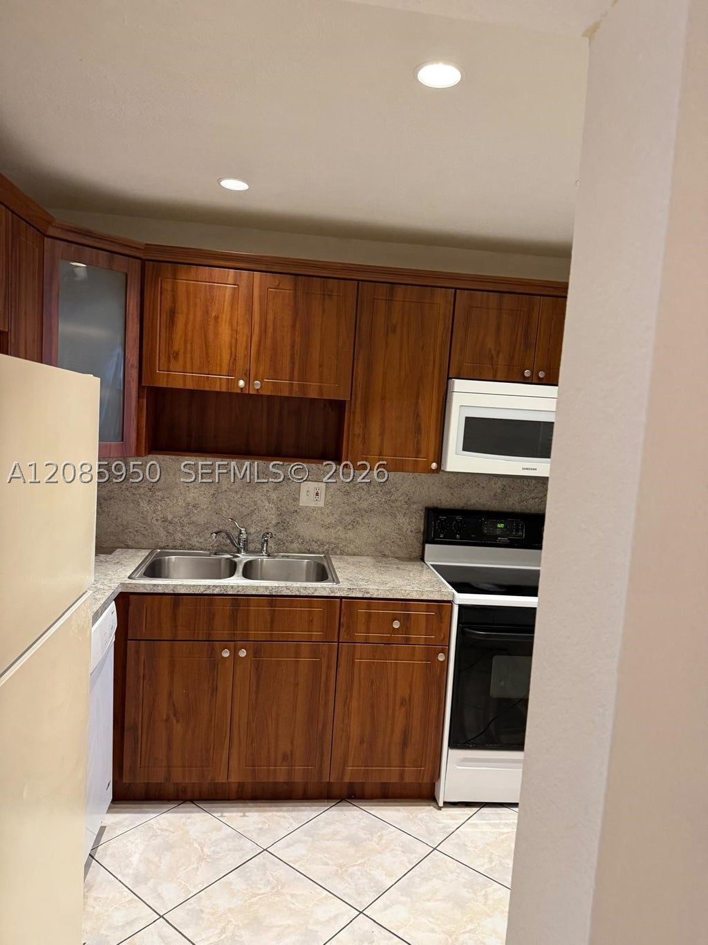 Photo of 8040 N Colony Cir N #304, Tamarac, FL 33321 (MLS # A12085950)