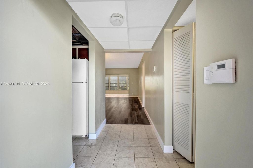 Photo of 1030 Country Club Dr #405, Margate, FL 33063 (MLS # A12023785)