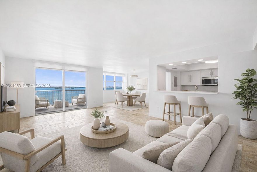 Rare opportunity to own one of the most desirable corner lines in the building. This 3-bedroom, 2-bath residence sits on the 14th floor and delivers unobstructed 180° views of Biscayne Bay, with water visible from every room.

The layout is efficient and clean, with natural light throughout and a true sense of openness that is difficult to replicate in this price range. The unit has been substantially renovated, featuring updated flooring, a modern kitchen, and a well-distributed living space that maximizes both functionality and views.

The primary suite includes a walk-in closet and a fully upgraded en-suite bathroom. Secondary bedrooms are properly sized, each with built-in storage and direct water views, which is uncommon in comparable units.

Includes two assigned parking spaces and a private storage unit, both considered premium assets in Brickell. The building is completing its 50-year certification, with amenities scheduled to be fully operational shortly.

No washer and dryer inside the unit. Laundry room available on every floor.