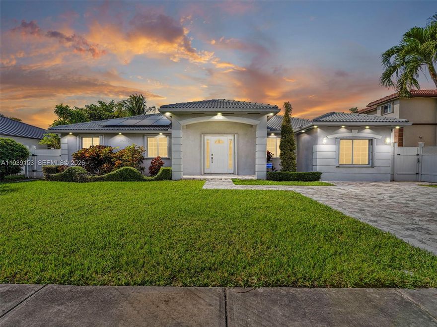 Step into this meticulously remodeled 3-bedroom, 3-bathroom sanctuary where modern elegance meets everyday comfort. The open-concept design flows seamlessly, creating an entertainer’s dream anchored by a chef-inspired kitchen and designer bathrooms. Imagine hosting weekend gatherings in your expansive outdoor kitchen or relaxing on the terrace overlooking a yard with ample room for your future resort-style pool. Need a home office? The oversized laundry room offers a flexible layout easily adapted to a quiet den or workspace. Complete with a premium paver driveway, this home is the perfect blend of style and function.