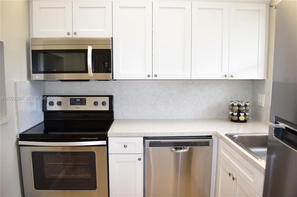 Photo of 8861 Sunrise Lakes Blvd #305, Sunrise, FL 33322 (MLS # A12022395)