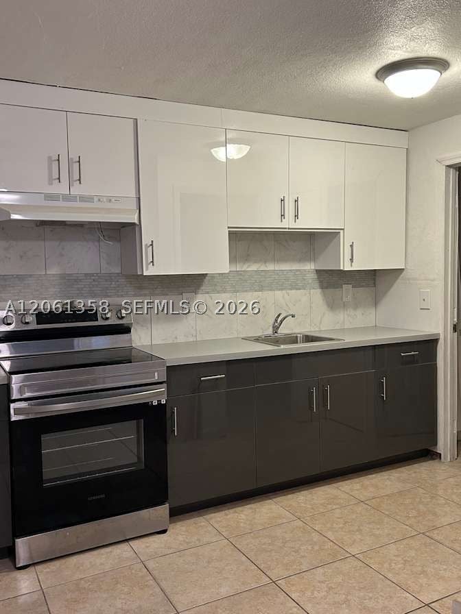 Photo of 236 NW 9th Ave, South Bay, FL 33493 (MLS # A12061358)