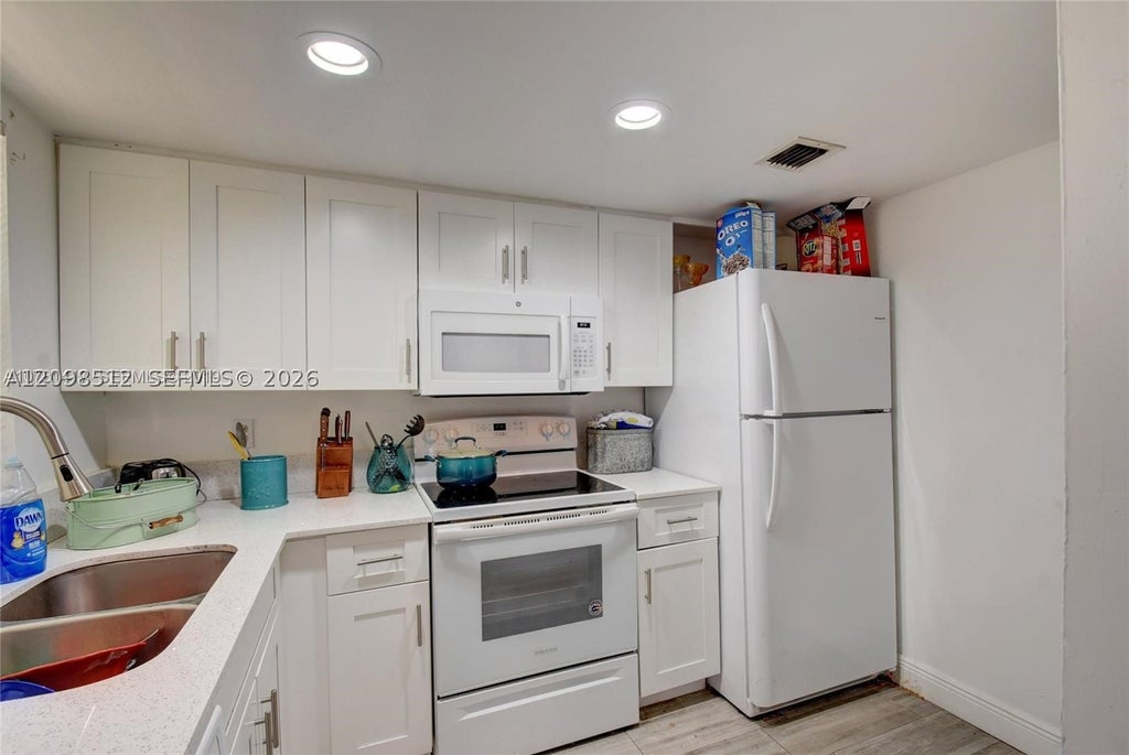 Photo of 7831 NW 44th Ct #7833, Coral Springs, FL 33065 (MLS # A12098512)