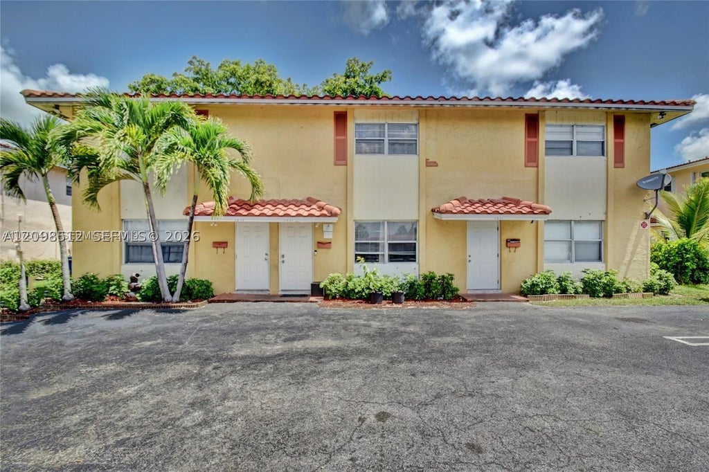 Photo of 7831 NW 44th Ct #7833, Coral Springs, FL 33065 (MLS # A12098512)