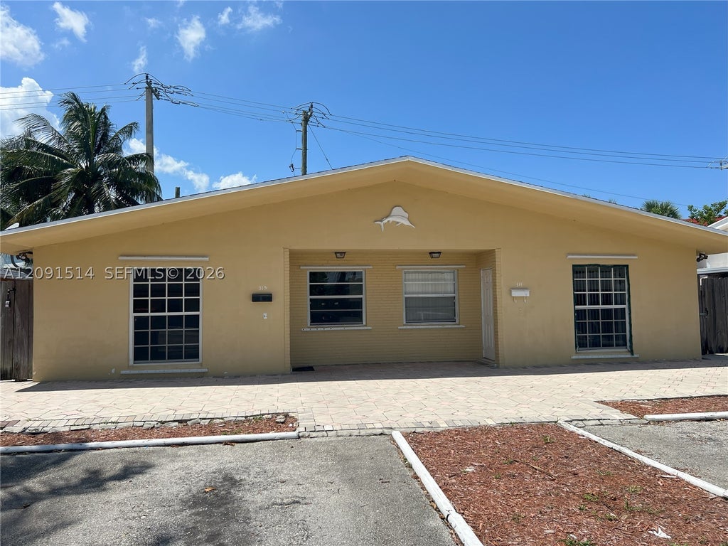 Photo of 311-315 NW 57th St, Oakland Park, FL 33309 (MLS # A12091514)