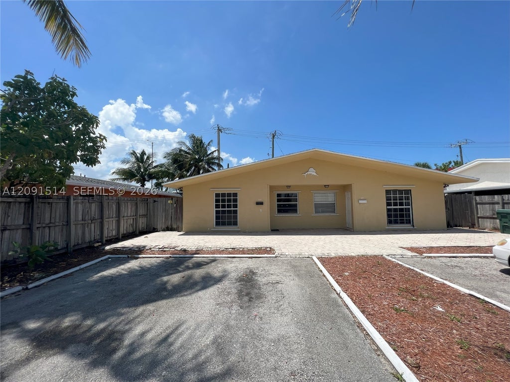 Photo of 311-315 NW 57th St, Oakland Park, FL 33309 (MLS # A12091514)