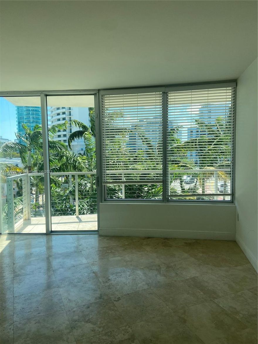 Location, location, location...Very spacious, beautiful 2 bed 2 baths, one block from the ocean. Mable floors, impact windows. Washer/dryer inside the unit. Close to Starbucks, restaurants, shops... A must see!!!!